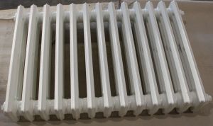 Radiateur en fonte  décapé et thermolaqué en blanc